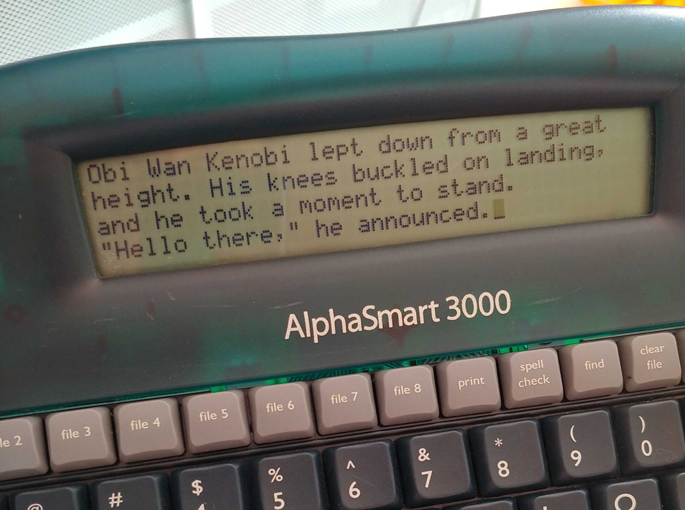 A short story about Obi Wan saying "hello there" displayed on the AlphaSmart's LCD screen